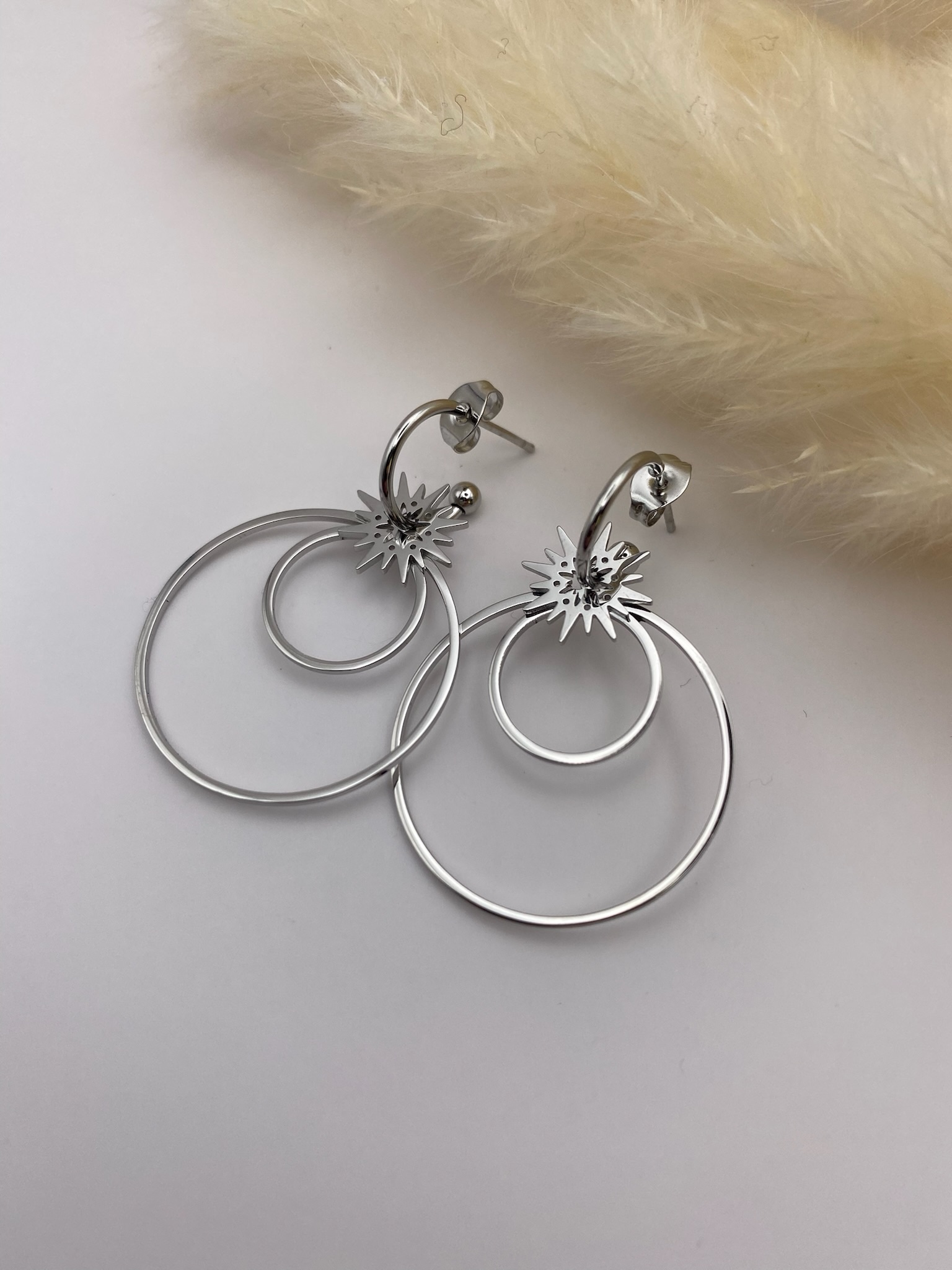 Boucles d&rsquo;oreilles soleil argentées