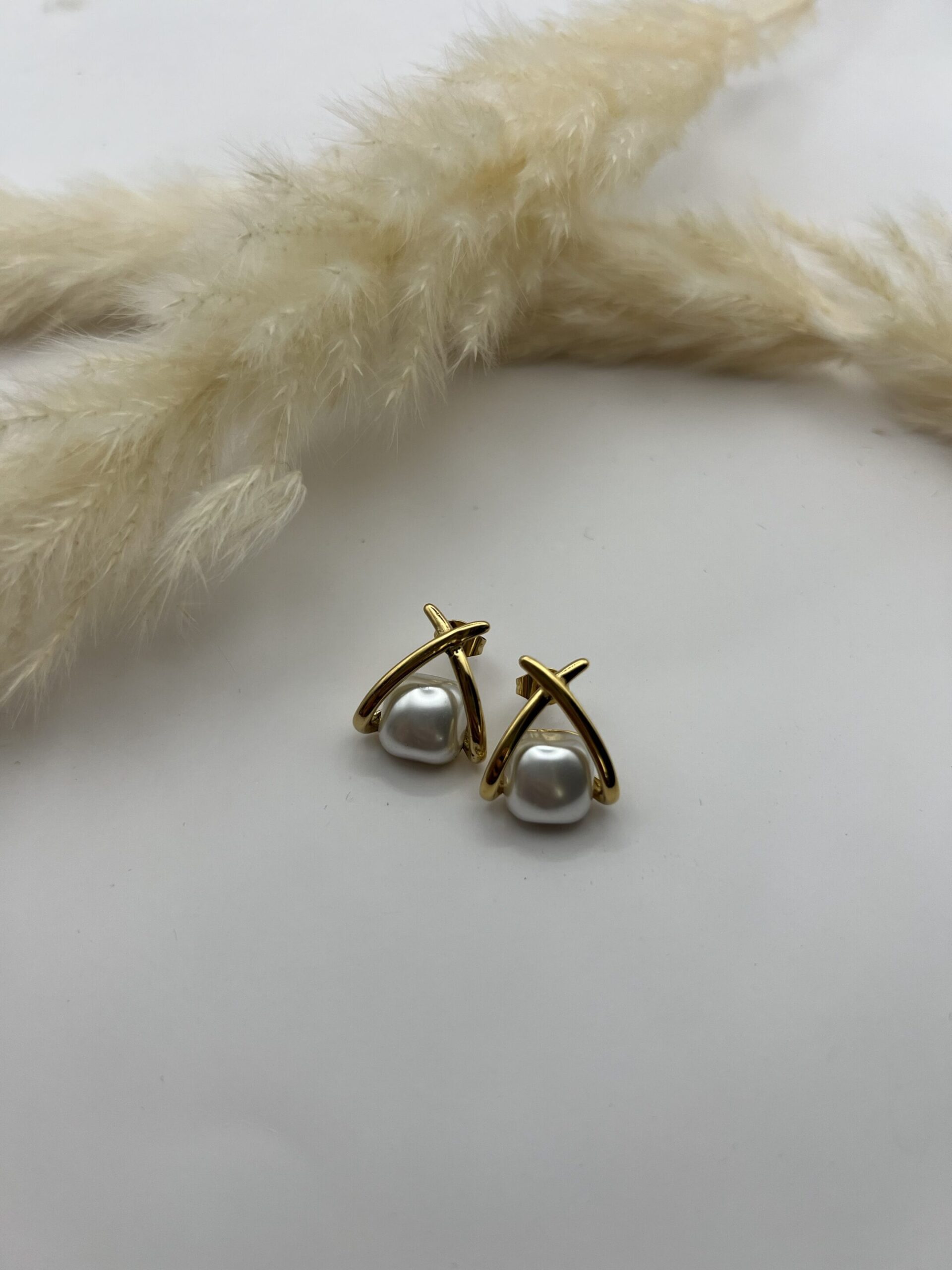 Boucles d&rsquo;oreilles perles dorées